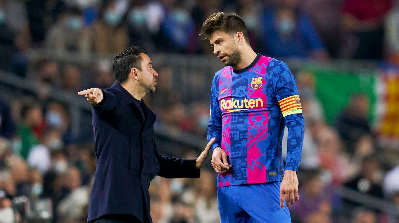 Xavi Hernandez și Gerard Pique au fost colegi la Barcelona între 2008 și 2015